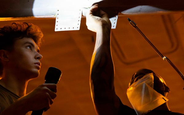 Abraham Lincoln conducts routine aircraft maintenance