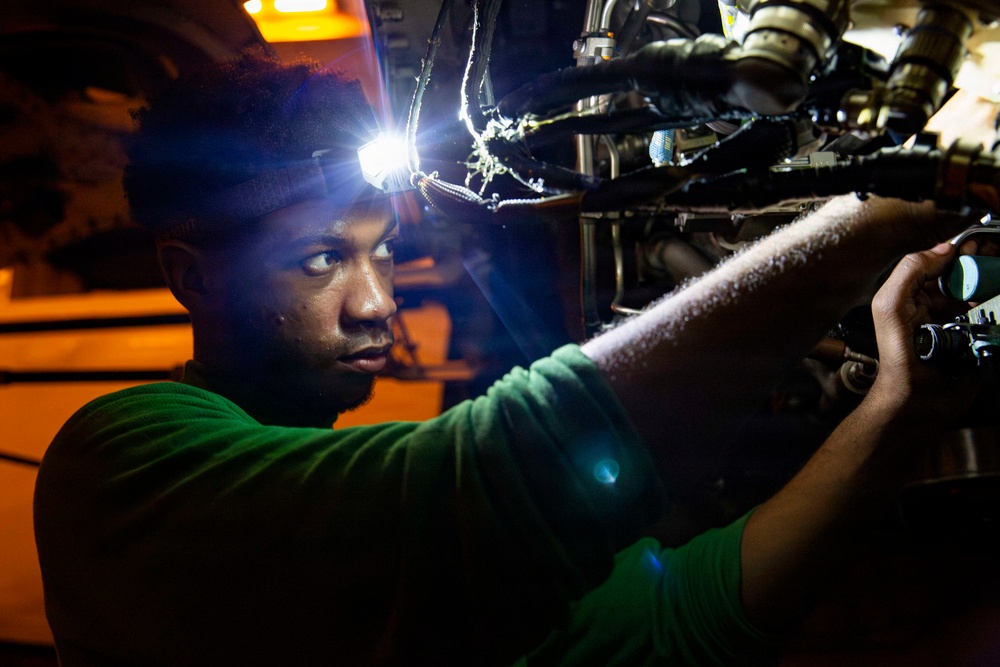Abraham Lincoln conducts routine aircraft maintenance