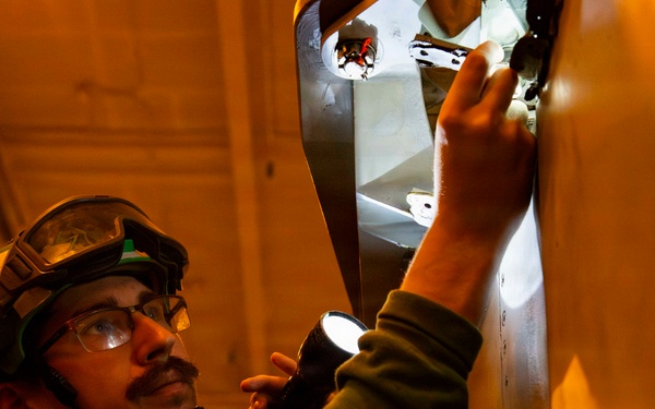 Abraham Lincoln conducts routine aircraft maintenance