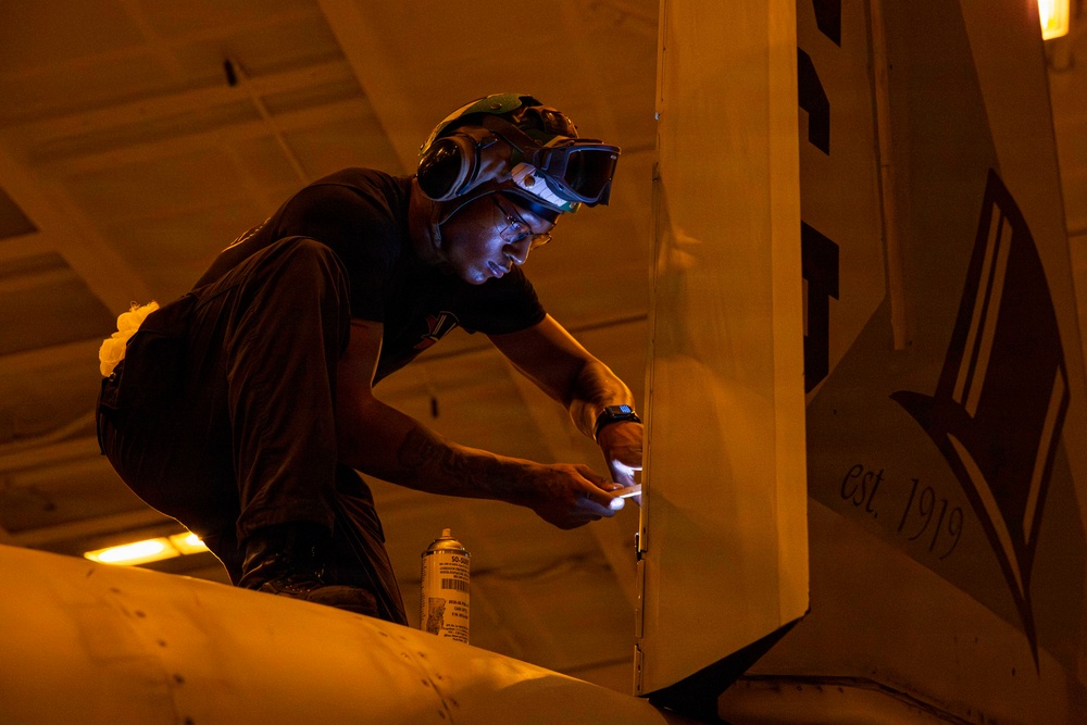 Abraham Lincoln conducts routine aircraft maintenance