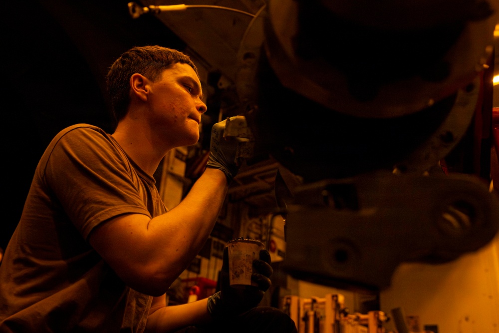 Abraham Lincoln conducts routine aircraft maintenance