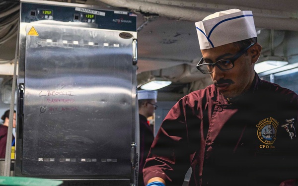 USS Theodore Roosevelt Prepares Food for Sailors