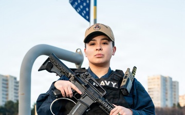 Retail Specialist Third Class Petty Officer Maria Vargas stands an Anti-Terrorism Force Protection watch