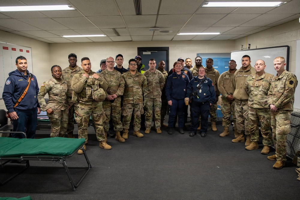 1-175th Infantry Regiment Soldiers Pose for a Photo with EMS personnel at Old Town Fire Station Prior to the Start of Operation Blur