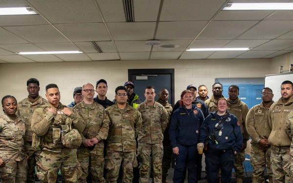 1-175th Infantry Regiment Soldiers Pose for a Photo with EMS personnel at Old Town Fire Station Prior to the Start of Operation Blur