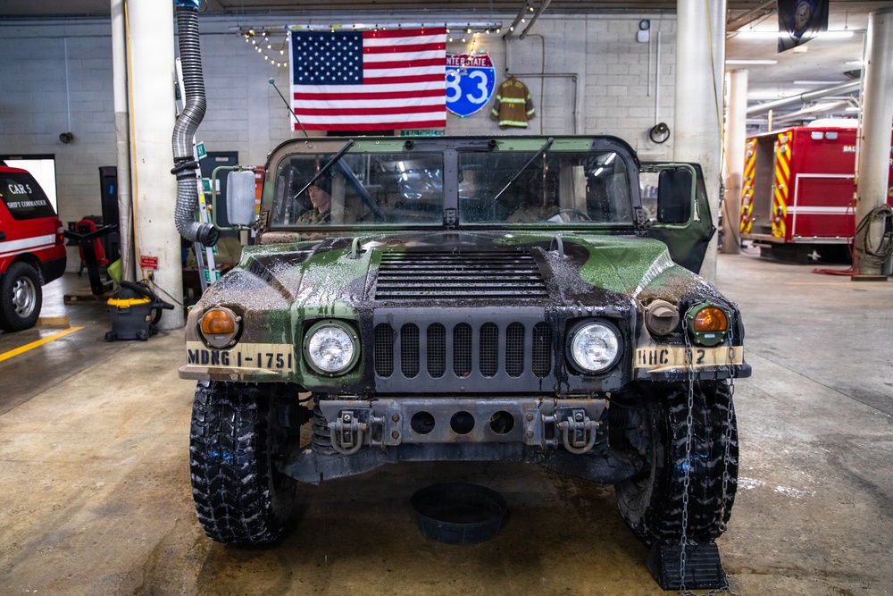 An M1097 High Mobility Multi-Wheeled Vehicle is Staged at Old Town Fire Station to Assist with EMS Transport