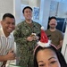 The Latte Stone Nursing Association arrived at U.S. Naval Hospital Guam on Christmas Day to spread some holiday cheer to the staff who were working.
