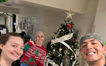 The Latte Stone Nursing Association arrived at U.S. Naval Hospital Guam on Christmas Day to spread some holiday cheer to the staff who were working.