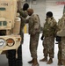 Soldiers Conduct Vehicle Maintenance in Snow