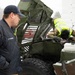 Soldier Conducts Vehicle Maintenance in Snow