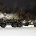 Military Vehicle Towed in Snow