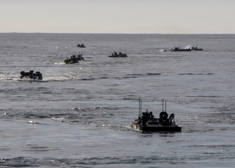 Amphibious combat vehicles disembark Makin Island