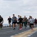Sailors and Marines Run on the Flight Deck Aboard USS Tripoli