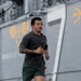 Sailors and Marines Run on the Flight Deck Aboard USS Tripoli