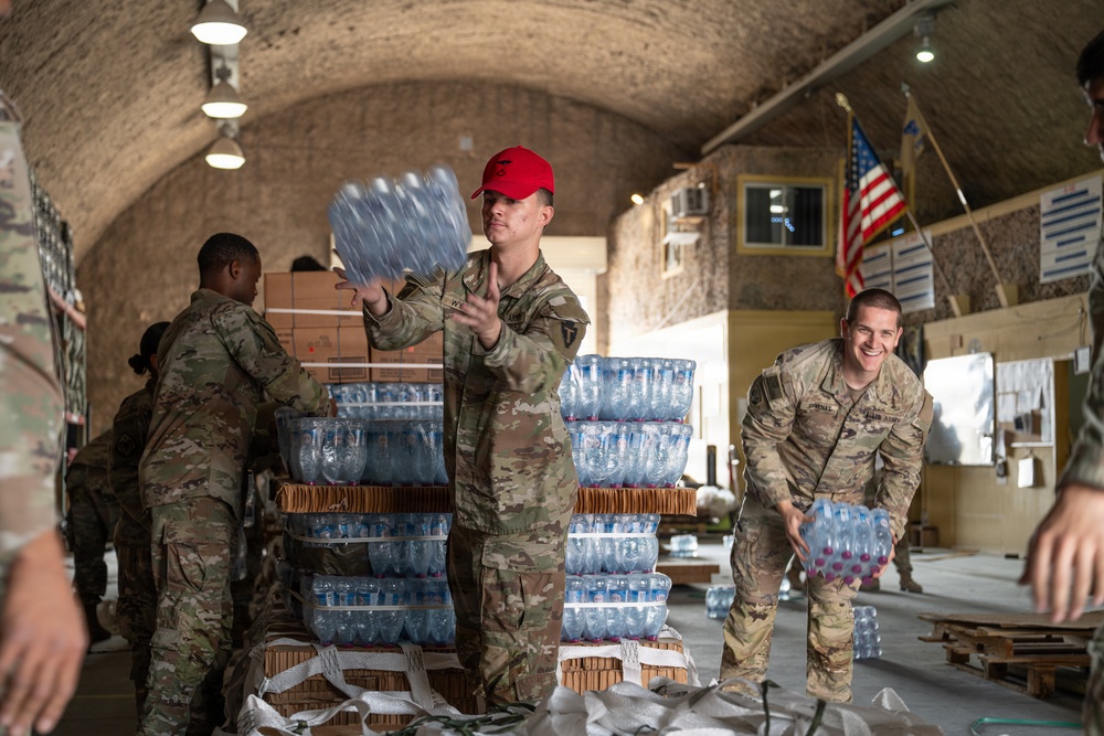 Texas National Guard 294th QM packages food, water for aerial delivery