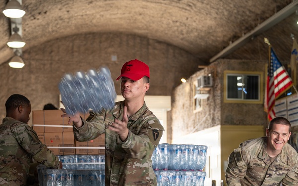 Texas National Guard 294th QM packages food, water for aerial delivery