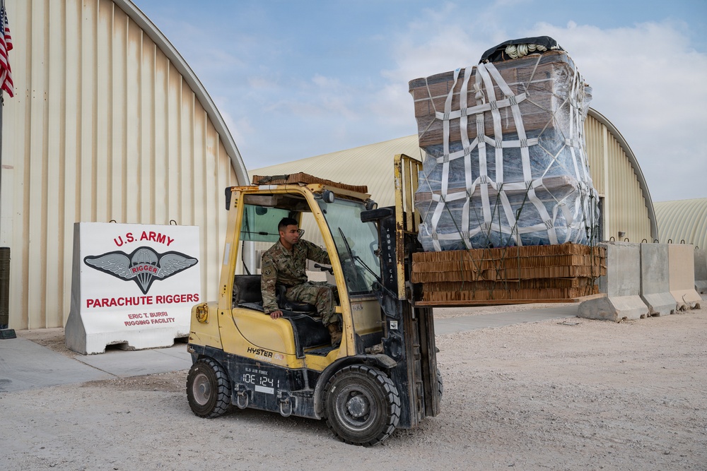 Texas National Guard 294th QM packages food, water for aerial delivery