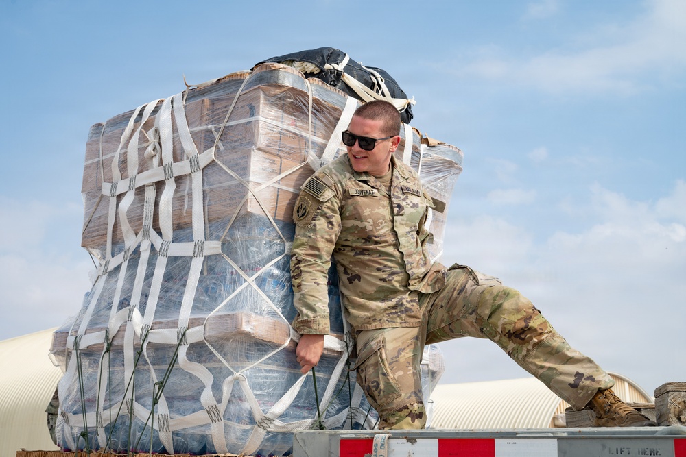 Texas National Guard 294th QM packages food, water for aerial delivery