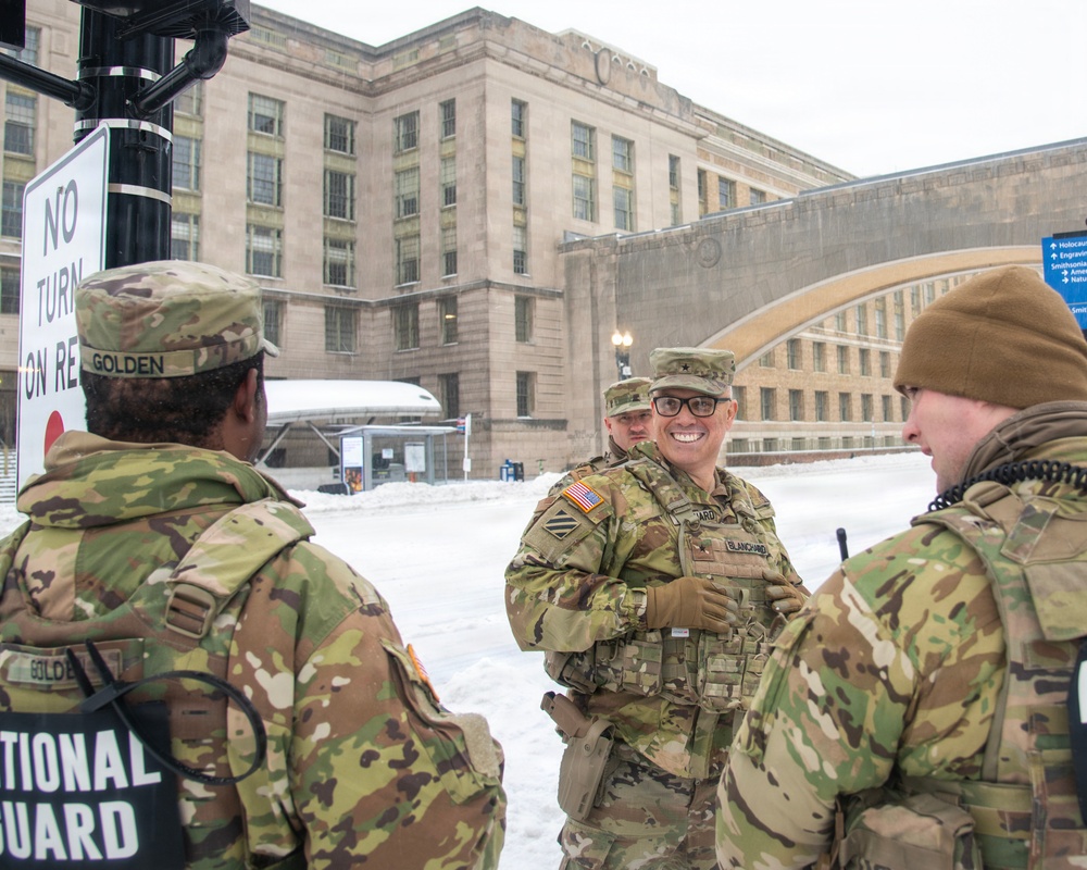 BG Blanchard visits service members during a snow storm in DC
