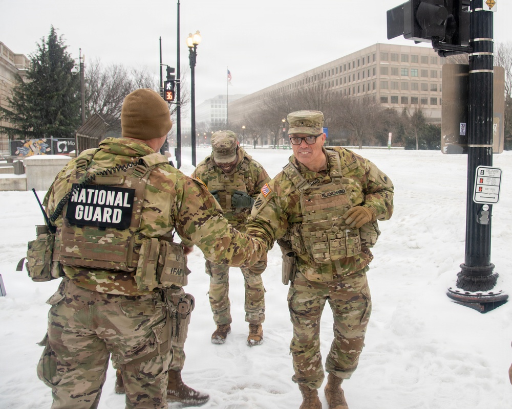 BG Blanchard visits service members during a snow storm in DC