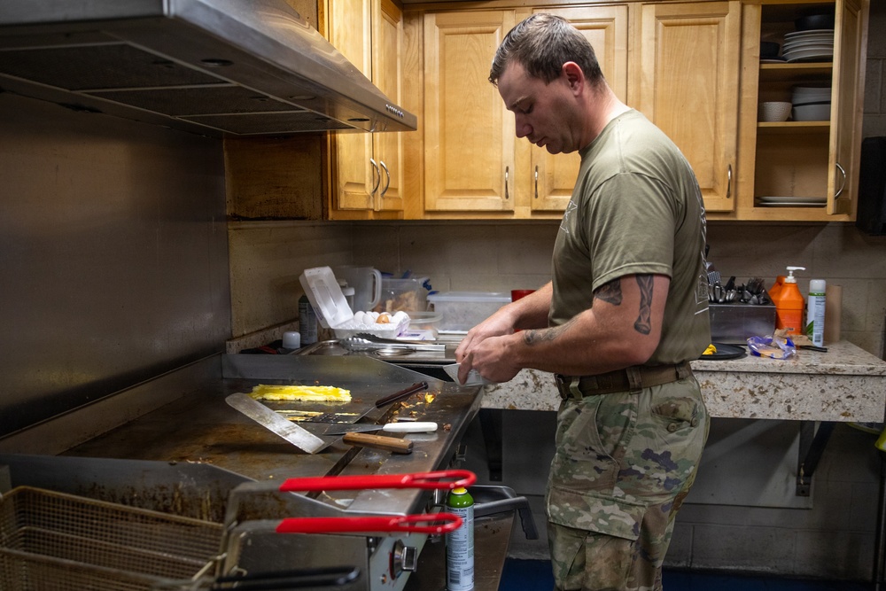 Maryland Army National Guard Sgt. James McPhate Prepares Breakfast for Troops
