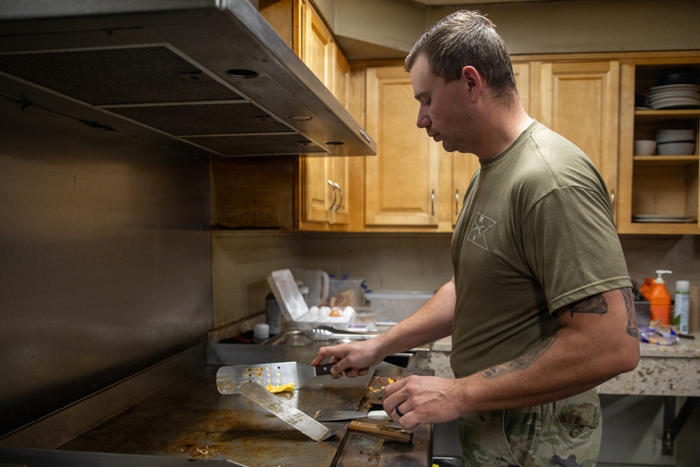Maryland Army National Guard Sgt. James McPhate Prepares Breakfast for Troops