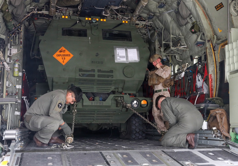 U.S. Marines with 1st Bn., 11th Marines execute HIMARS embarkation
