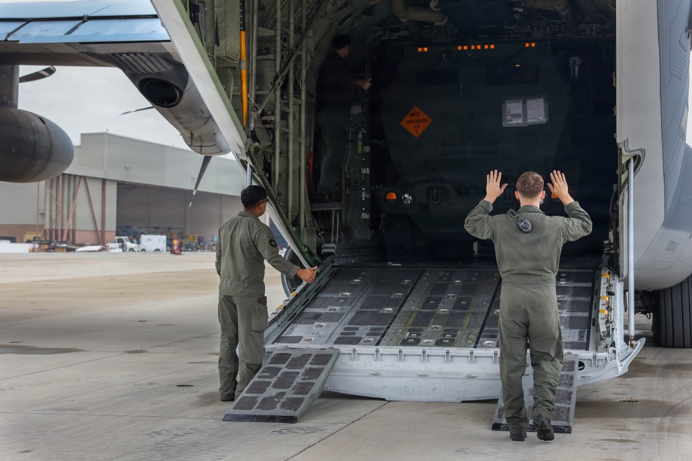 U.S. Marines with 1st Bn., 11th Marines execute HIMARS embarkation
