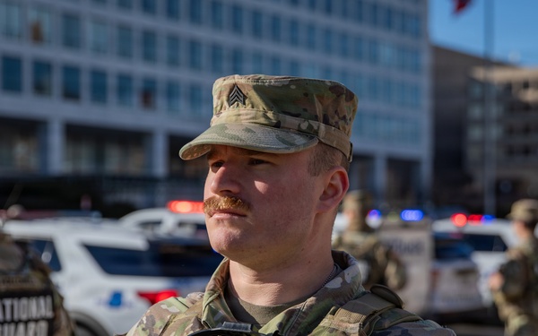 A Mississippi National Guard service member joins a dignified escort in Washington, D.C.