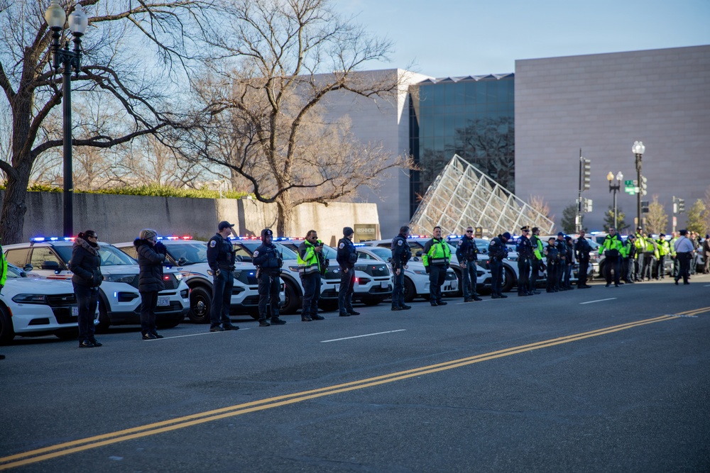 Metropolitan Police Department Officers join a dignified escort in Washington, D.C.