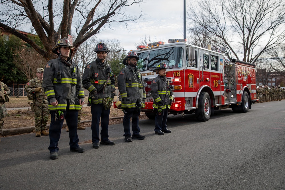District of Columbia Firefighters arrive to render honors during a funeral escort in Washington, D.C.