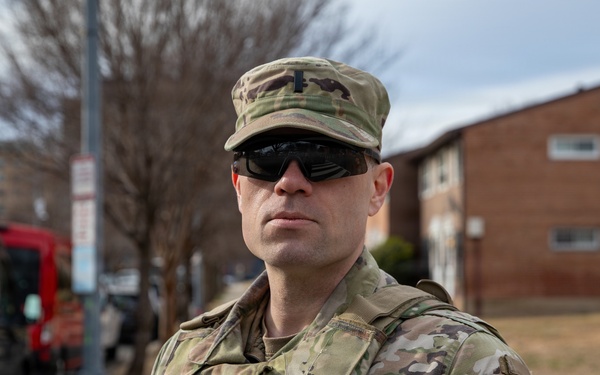 An Ohio National Guard Soldier arrives to render honors during a funeral escort in Washington, D.C.