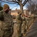 Mississippi National Guard service members salute a fallen officer during a dignified escort in Washington, D.C.