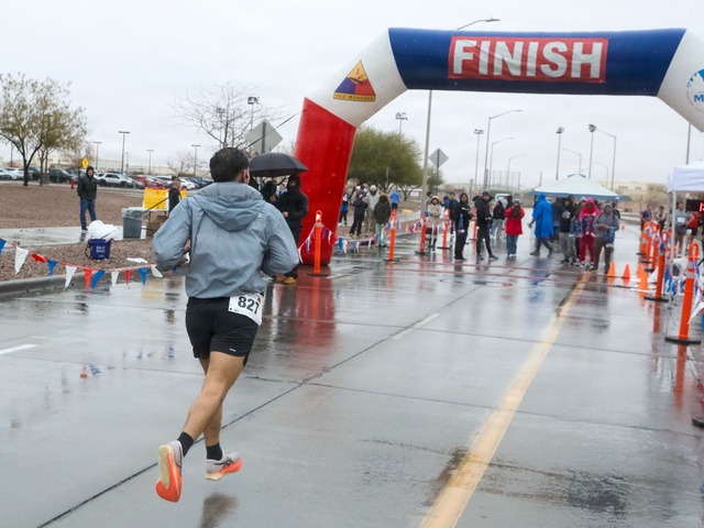 Iron Will: Fort Bliss community braves rain for FMWR half marathon, health fair