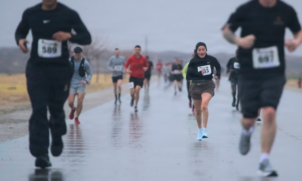 Iron Will: Fort Bliss community braves rain for FMWR half marathon, health fair