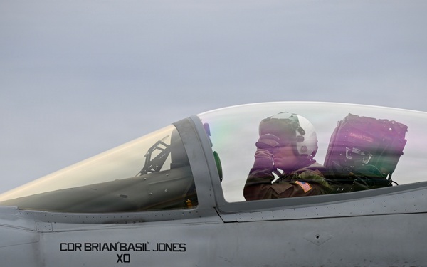Sailor prepares an F/A-18E for takeoff at NAS Oceana