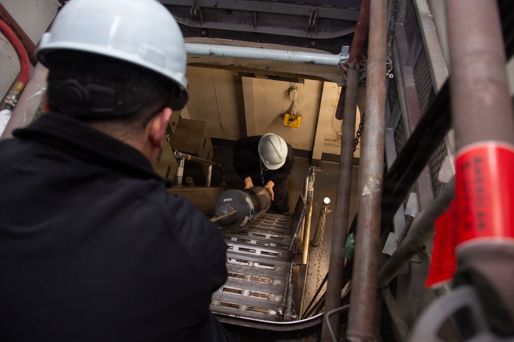 Ronald Reagan Sailors and Contractors Carry Out Maintenance