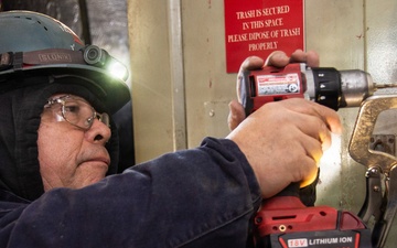 Ronald Reagan Sailors and Contractors Carry Out Maintenance