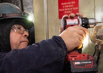 Ronald Reagan Sailors and Contractors Carry Out Maintenance