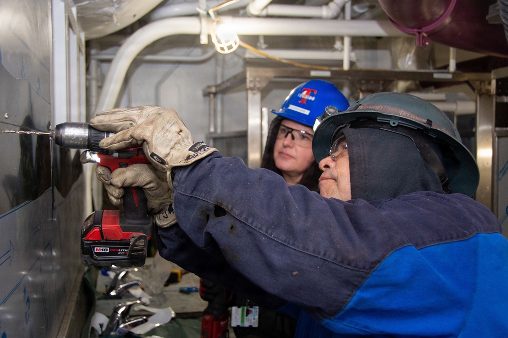 Ronald Reagan Sailors and Contractors Carry Out Maintenance