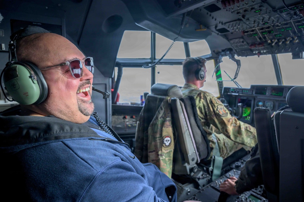 Comedian Gabriel Iglesias flies aboard C-130J at Yokota Air Base