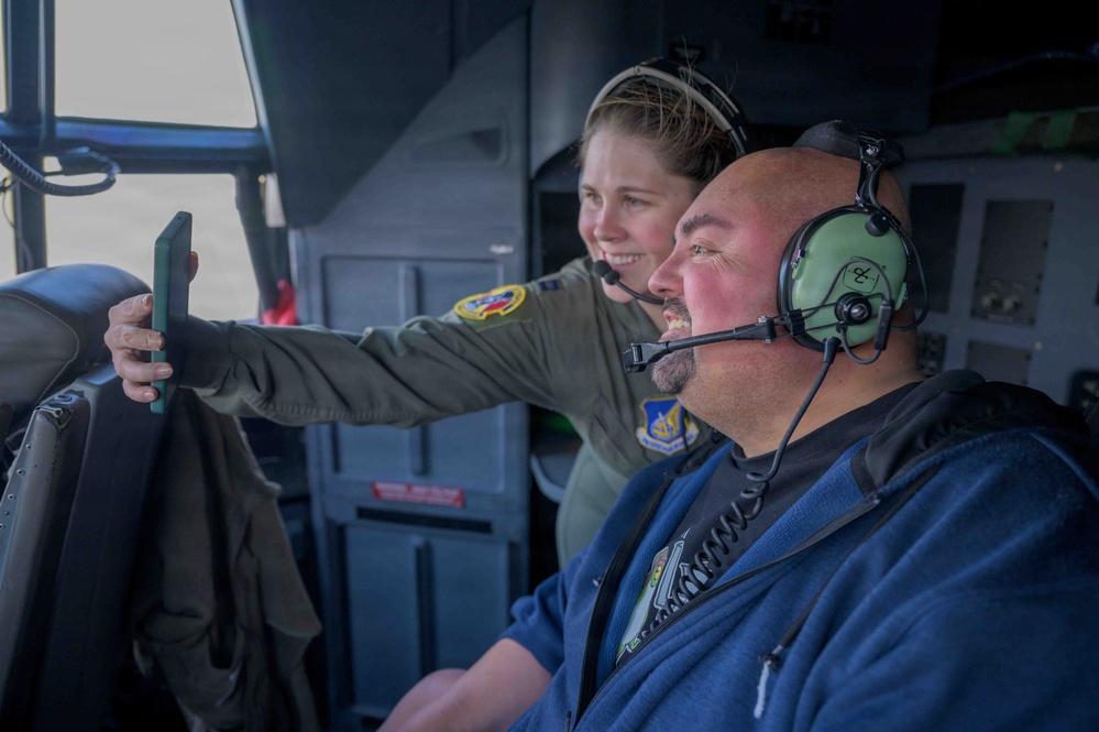 Comedian Gabriel Iglesias flies aboard C-130J at Yokota Air Base