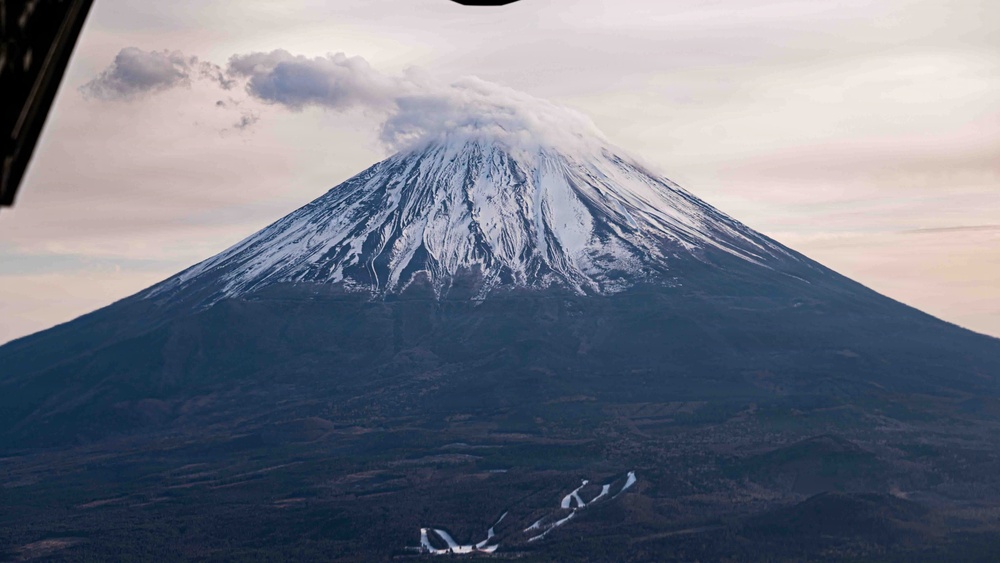 Comedian Gabriel Iglesias flies aboard C-130J at Yokota Air Base