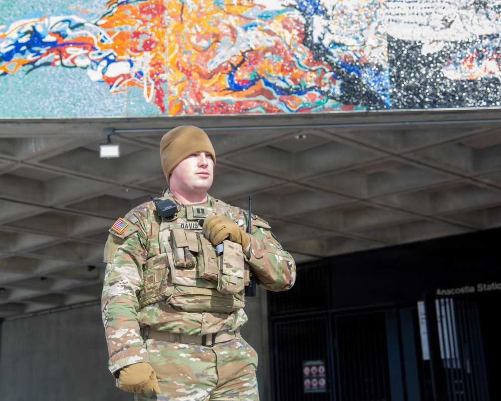 Service members perform duties in heavy snow