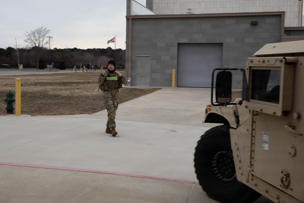 U.S. Army National Guard Lt. Cody Moore Prepares Vehicles for Transport During Operation Blur