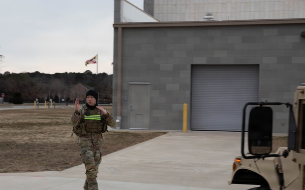 U.S. Army National Guard Lt. Cody Moore Prepares Vehicles for Transport During Operation Blur
