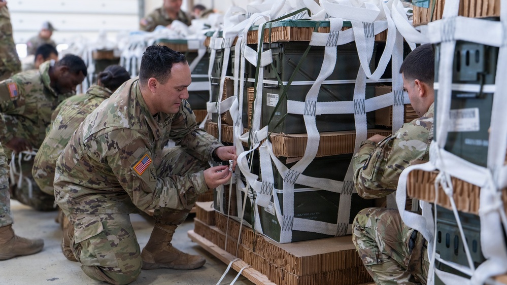 Soldiers Inspecting CDS Bundles