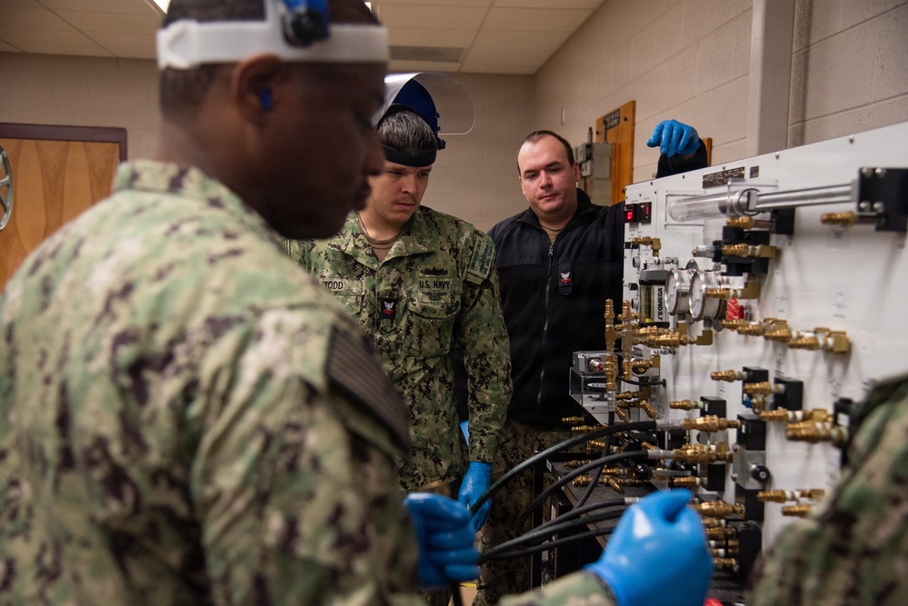 Surface Warfare Engineering Schools Command (SWESC) Great Lakes Instructors Train Next Generation of U.S. Navy Cargo Weapons Elevator Operators
