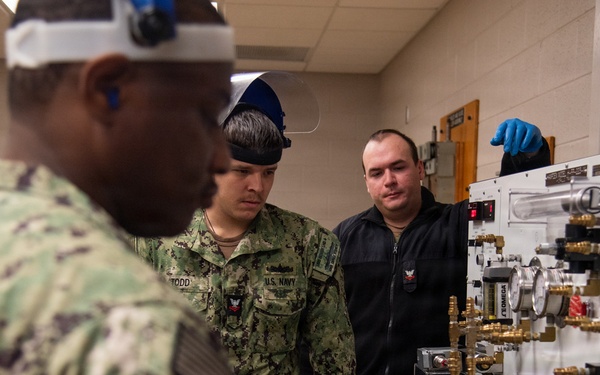 Surface Warfare Engineering Schools Command (SWESC) Great Lakes Instructors Train Next Generation of U.S. Navy Cargo Weapons Elevator Operators