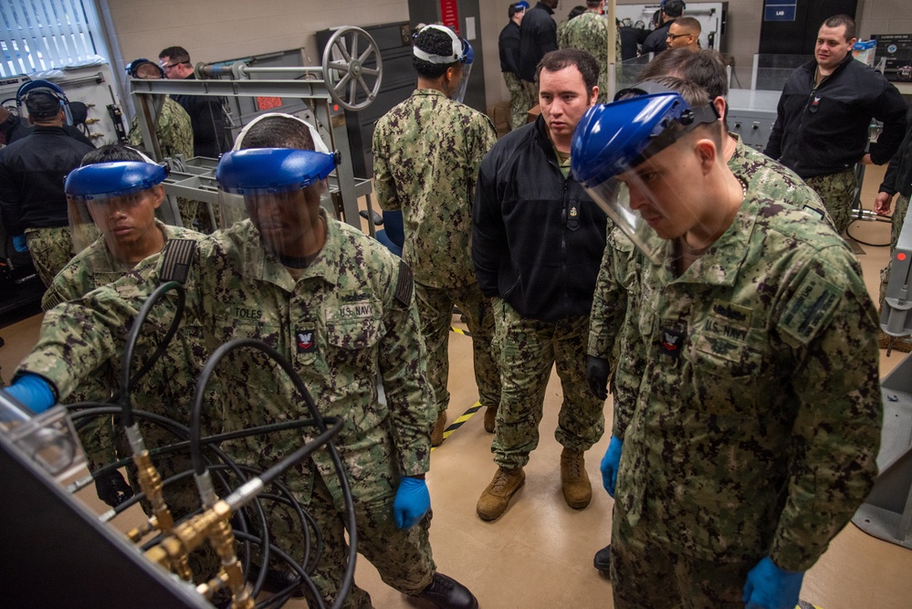 Surface Warfare Engineering Schools Command (SWESC) Great Lakes Instructors Train Next Generation of U.S. Navy Cargo Weapons Elevator Operators